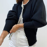 Cardigan med perlekant