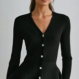 Ribstrikket peplum-top med knapper